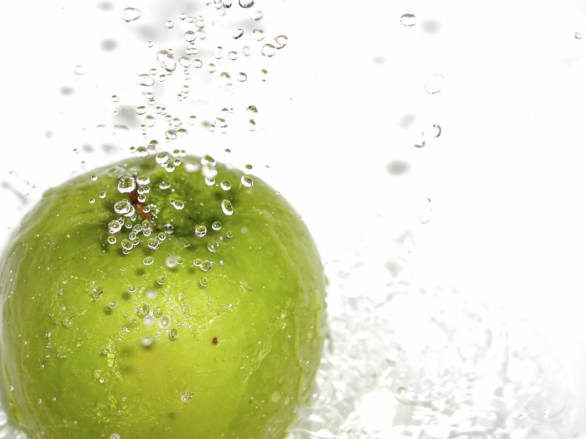 green apple in water