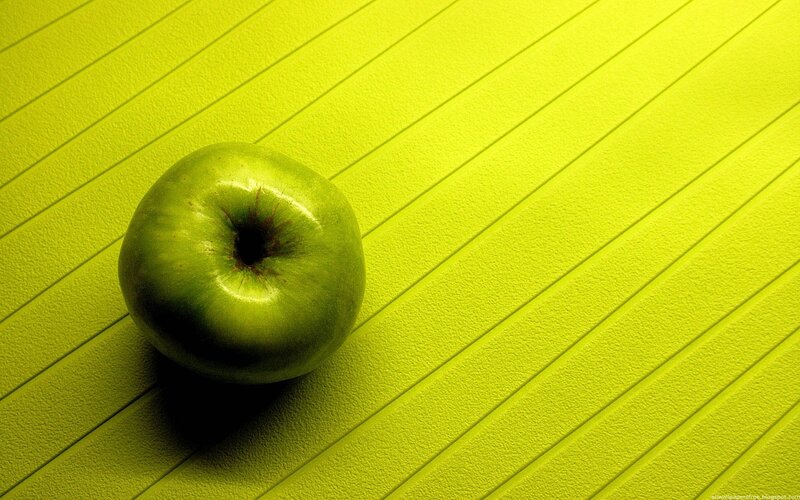 Green Apple on Surface — Yellow