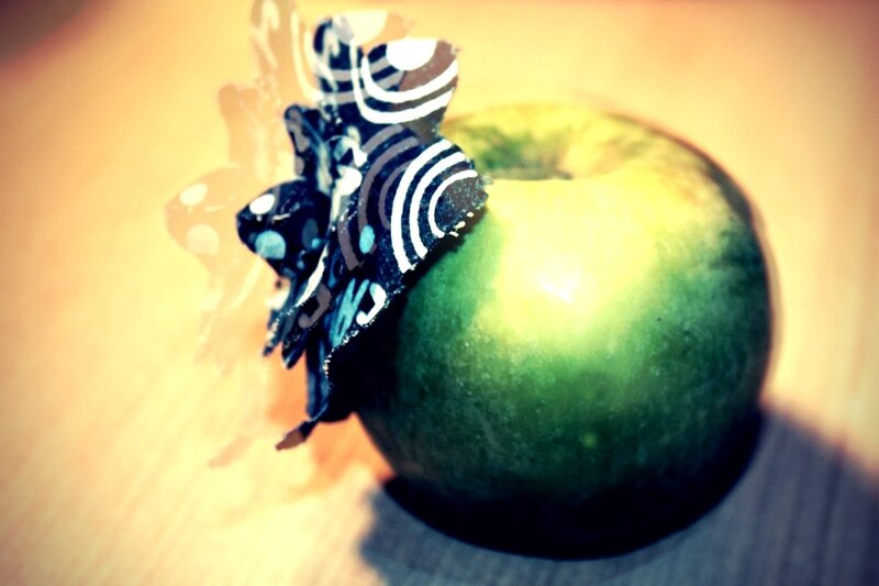green apple with bow