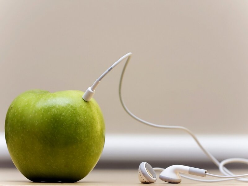 Green Apple with Earbuds — Neutral