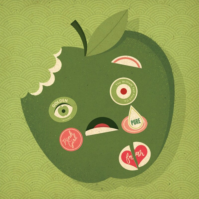 green apple with stickers