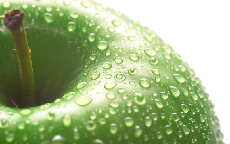 green apple with water droplets