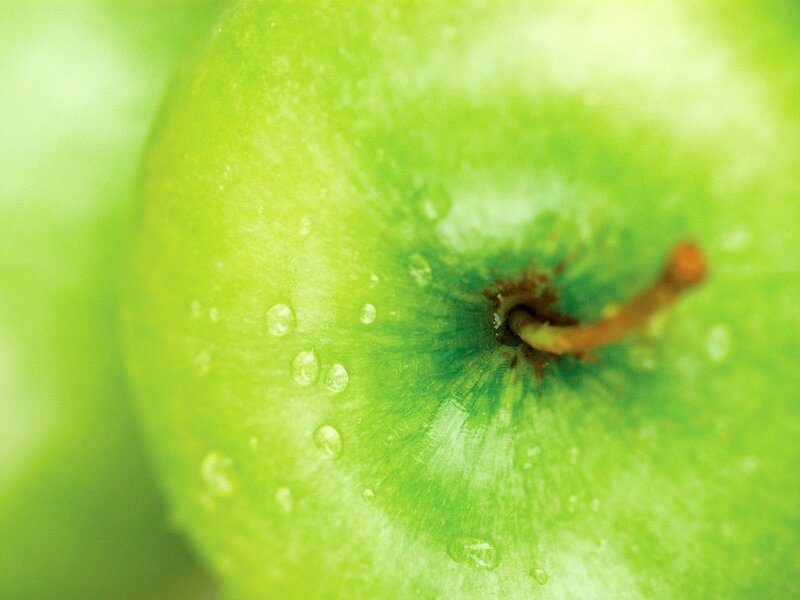 green apple with water droplets