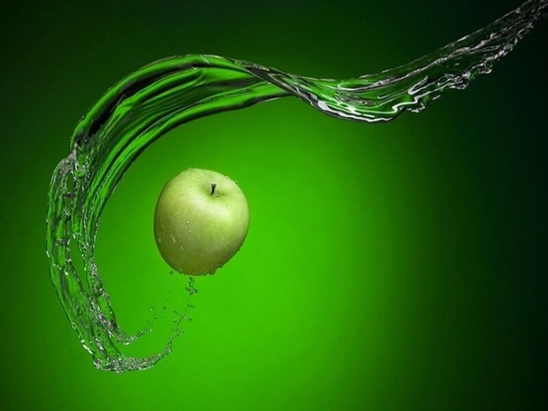 green apple with water splash