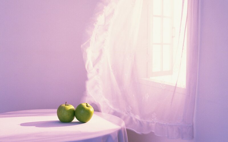 green apples by the window