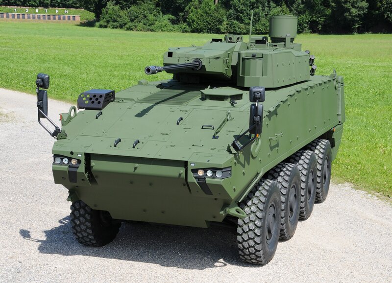Green armored military vehicle