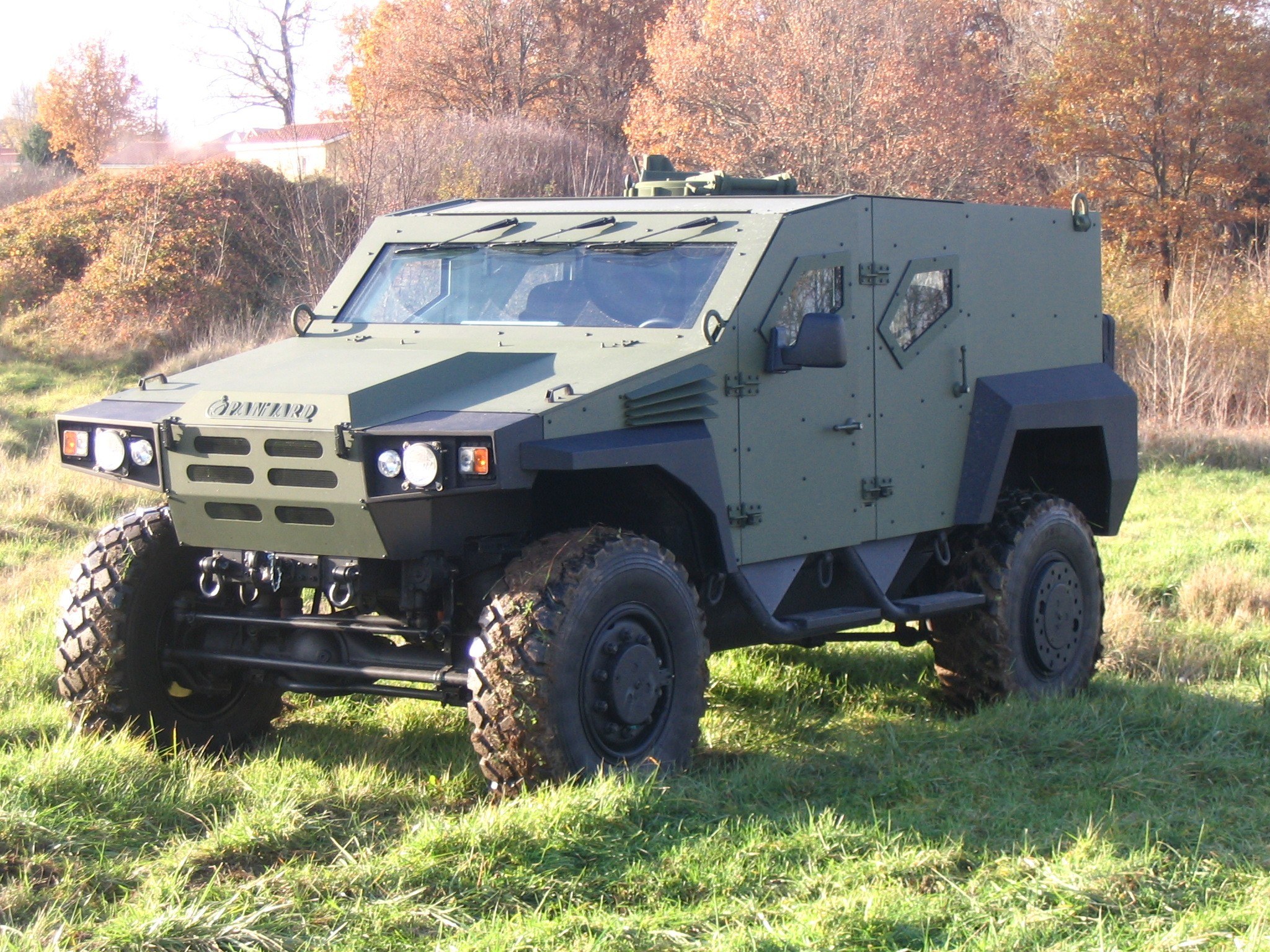 Green armored military vehicle