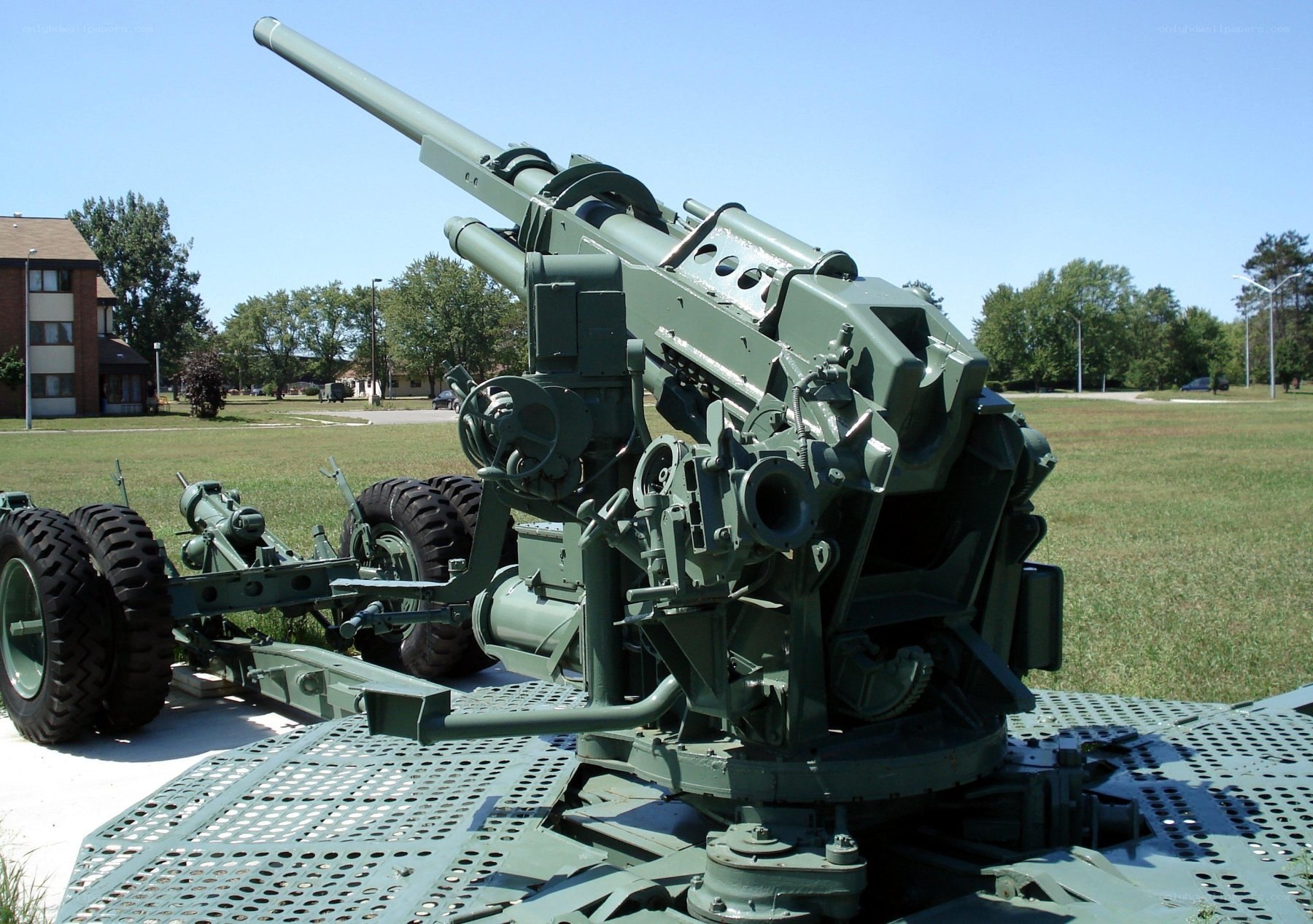 Green artillery gun on display