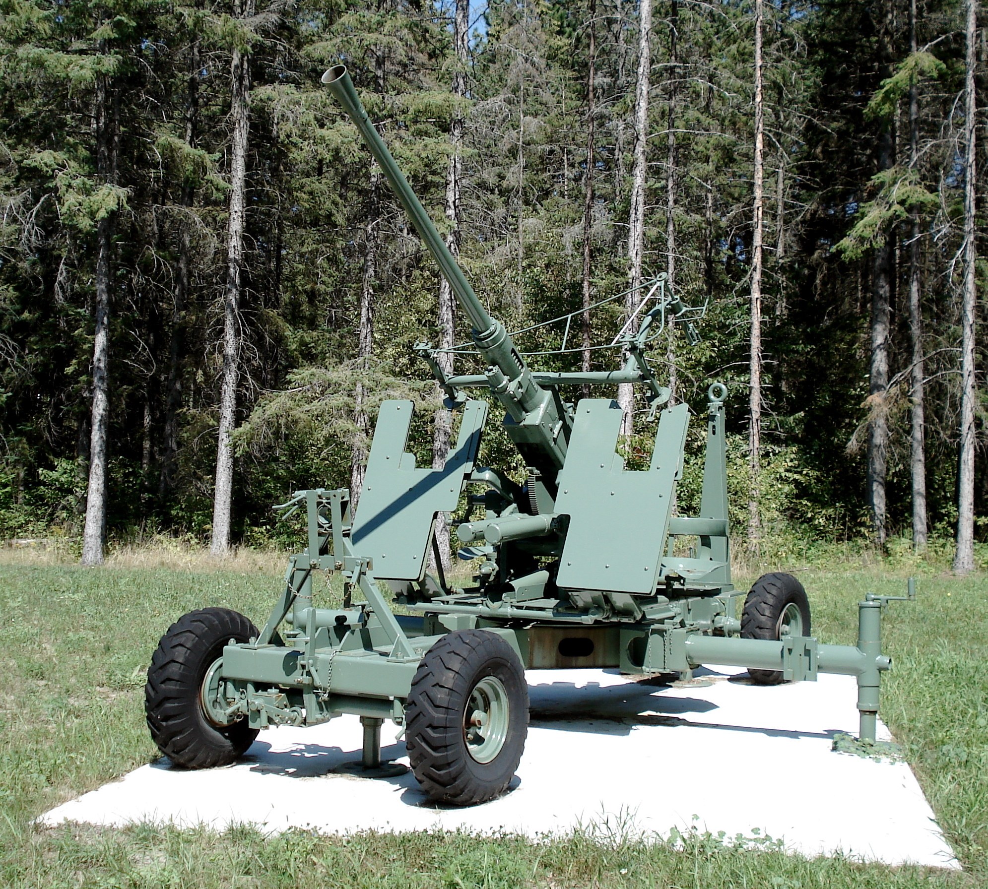Green artillery gun on display