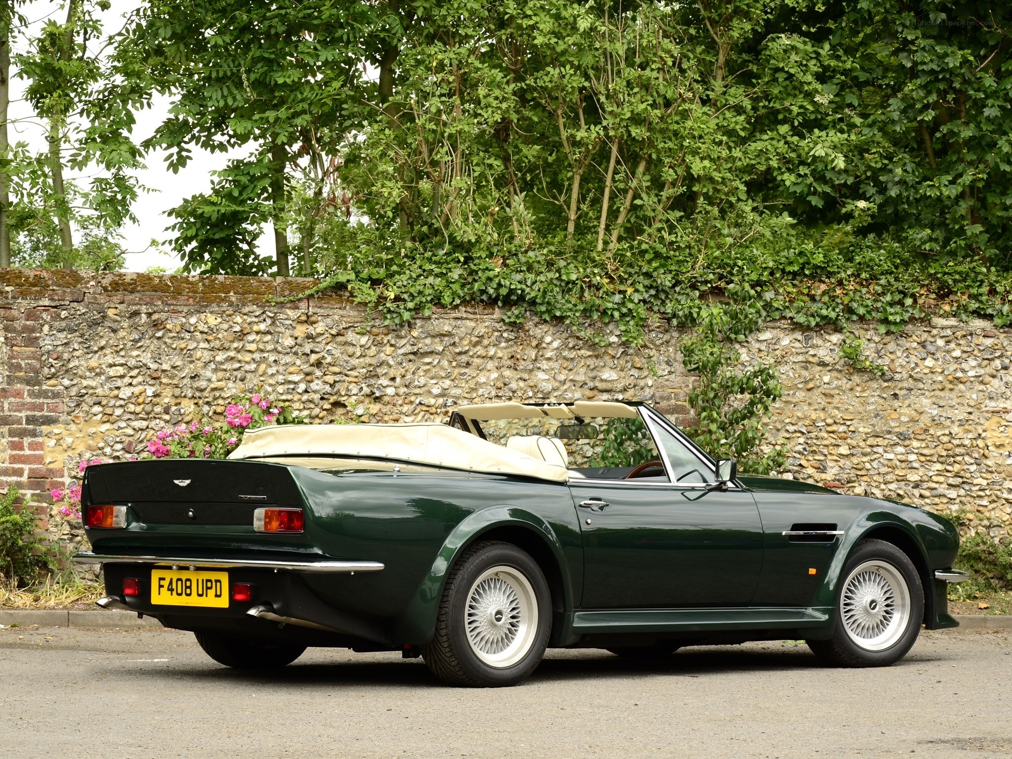 Green Aston Martin convertible