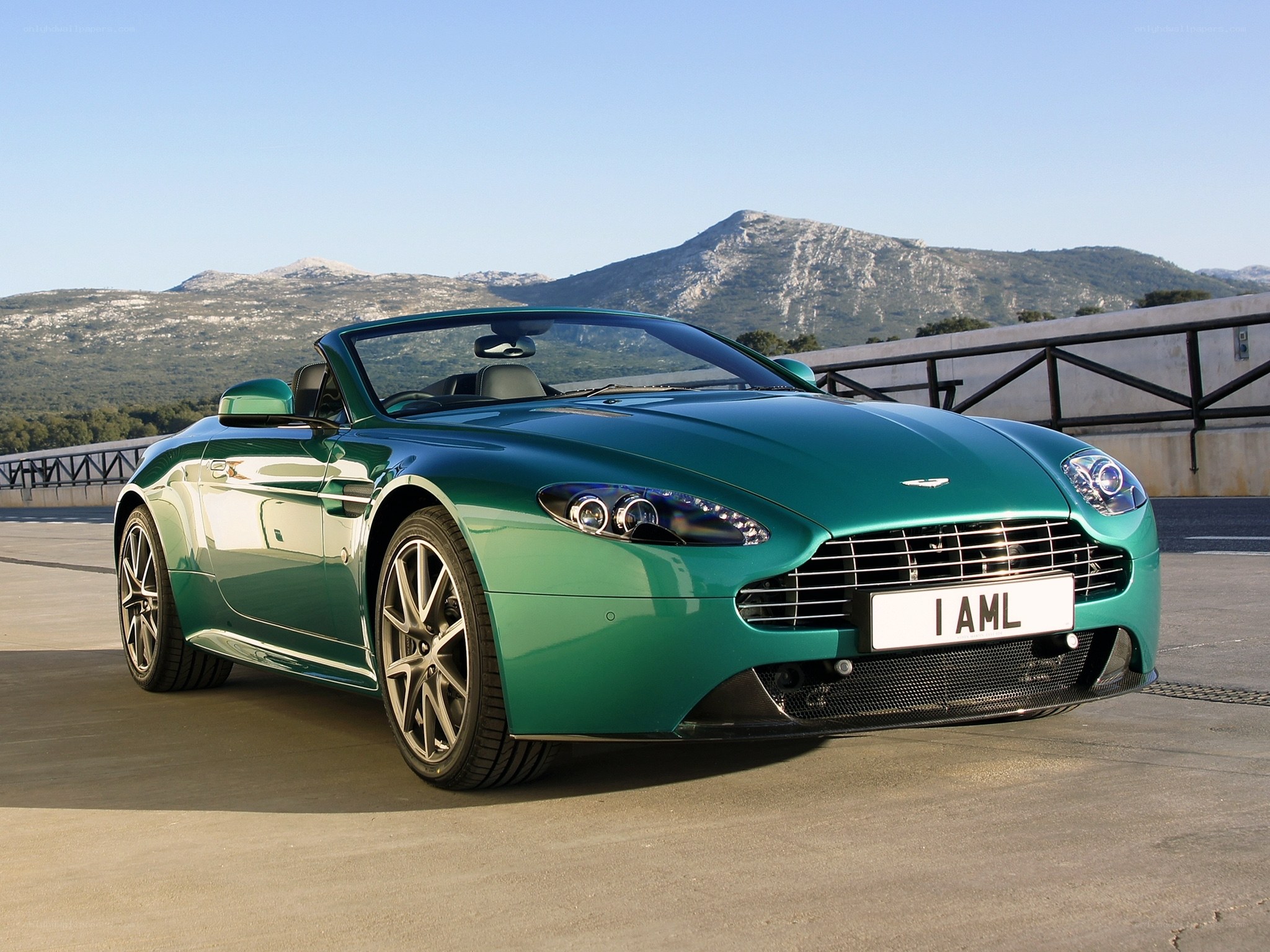 Green Aston Martin convertible