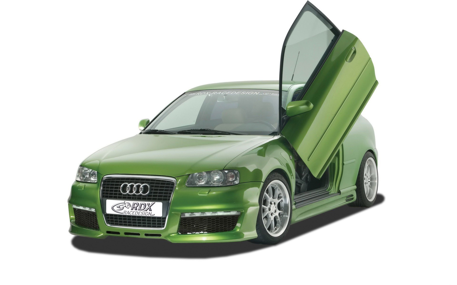 Green Audi with gullwing door