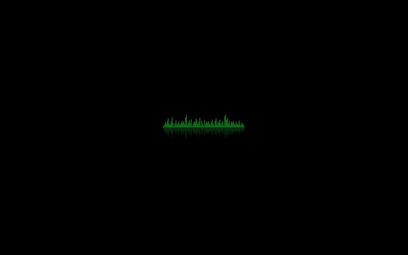 green audio waveform on black