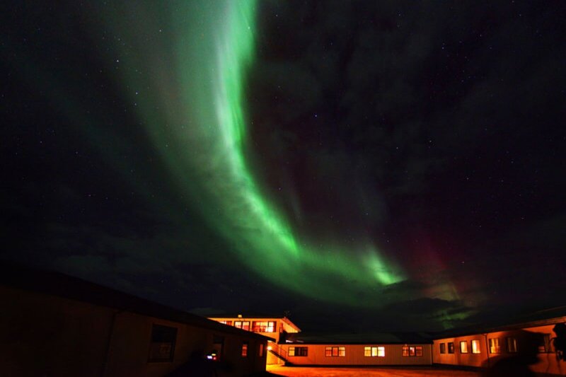 Green Aurora Borealis — Dramatic, Night, Photograph, Building