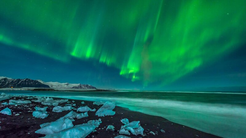 Green Aurora over Ice Beach
