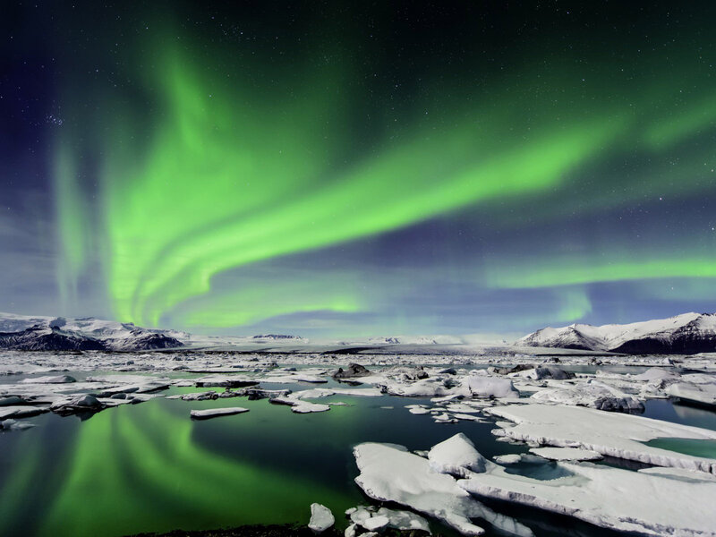 Green Aurora over Ice — Dramatic