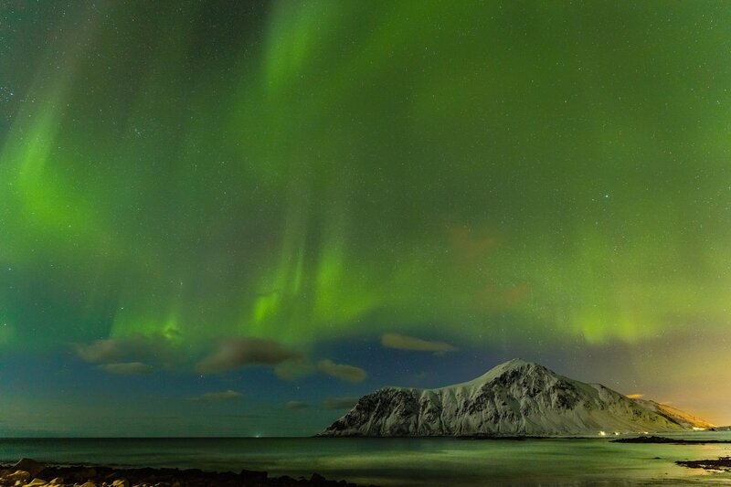 Green Aurora over Mountain — Serene