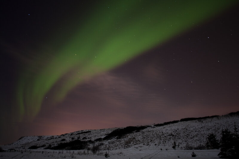 Green Aurora over Snowy Hill