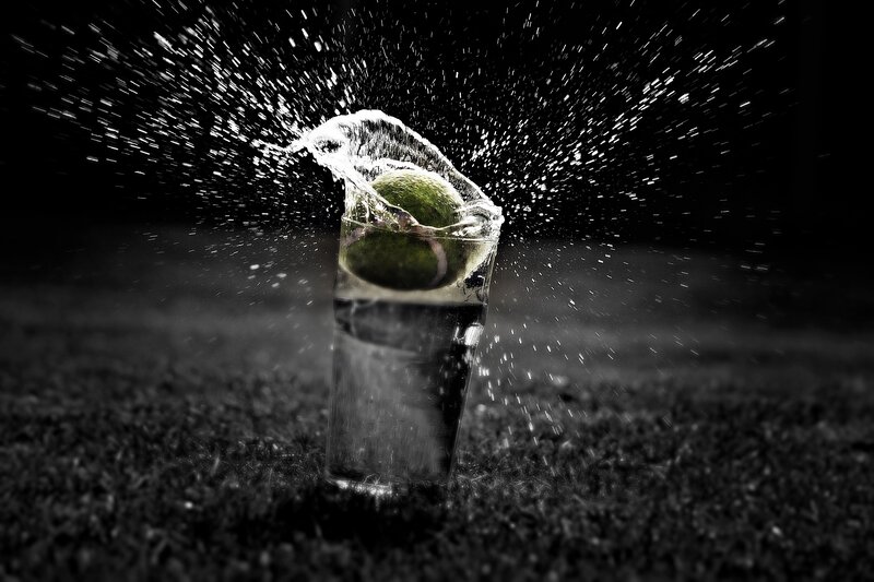 Green Ball in Water Splash