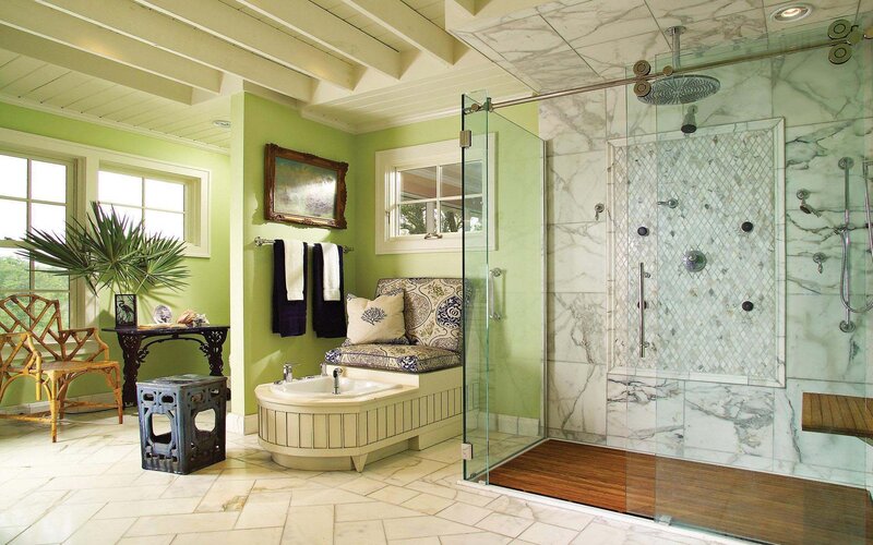 green bathroom with shower and tub
