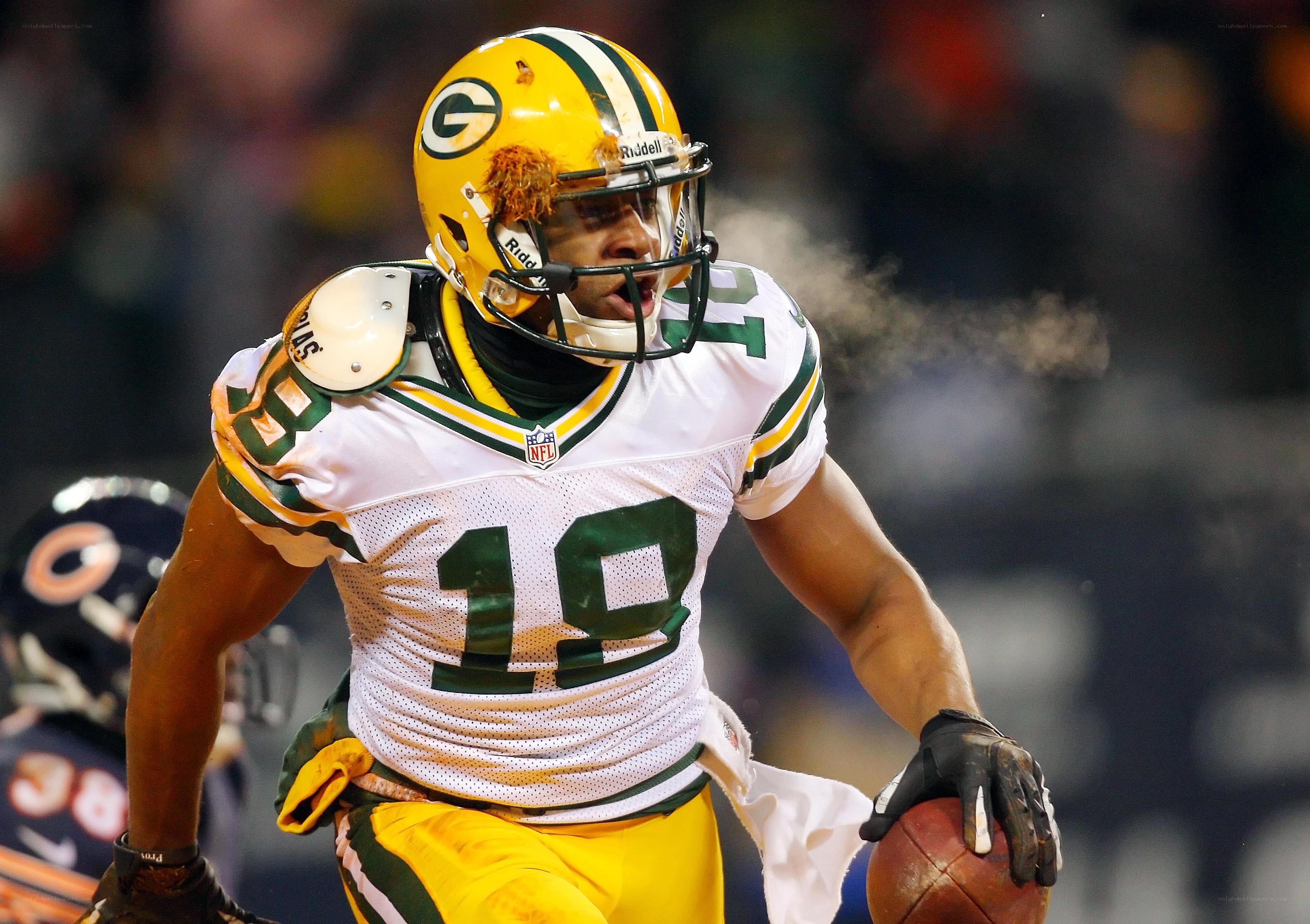 Green Bay Packers player running with ball