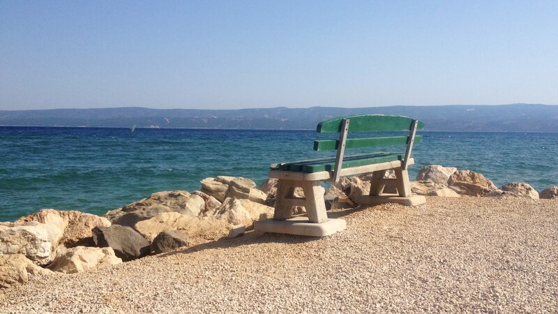 Green Bench on Beach