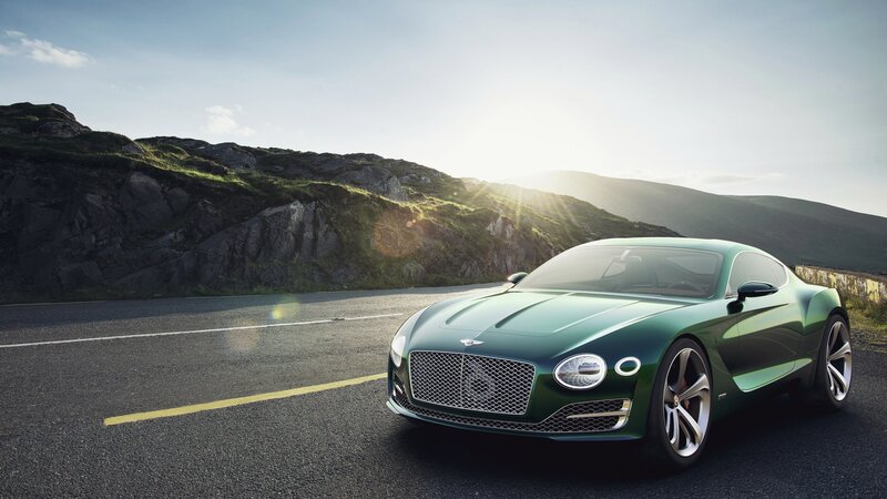 Green Bentley on a mountain road