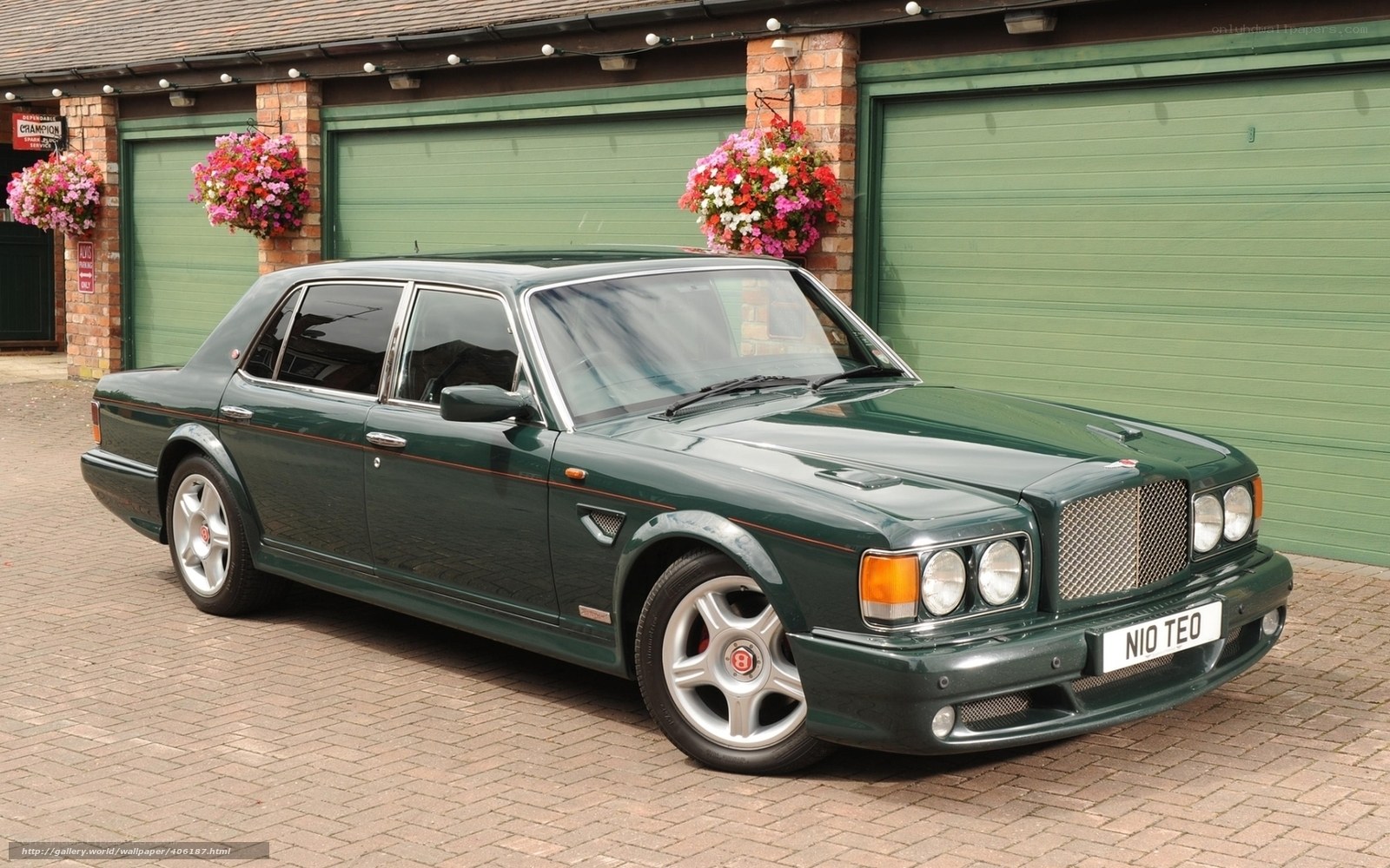 green bentley parked outside