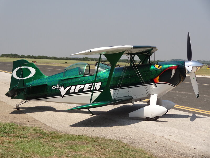 Green Biplane on Tarmac — Calm
