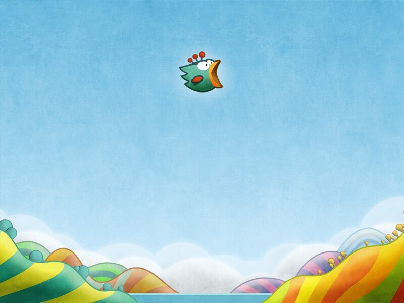 green bird flying over colorful hills