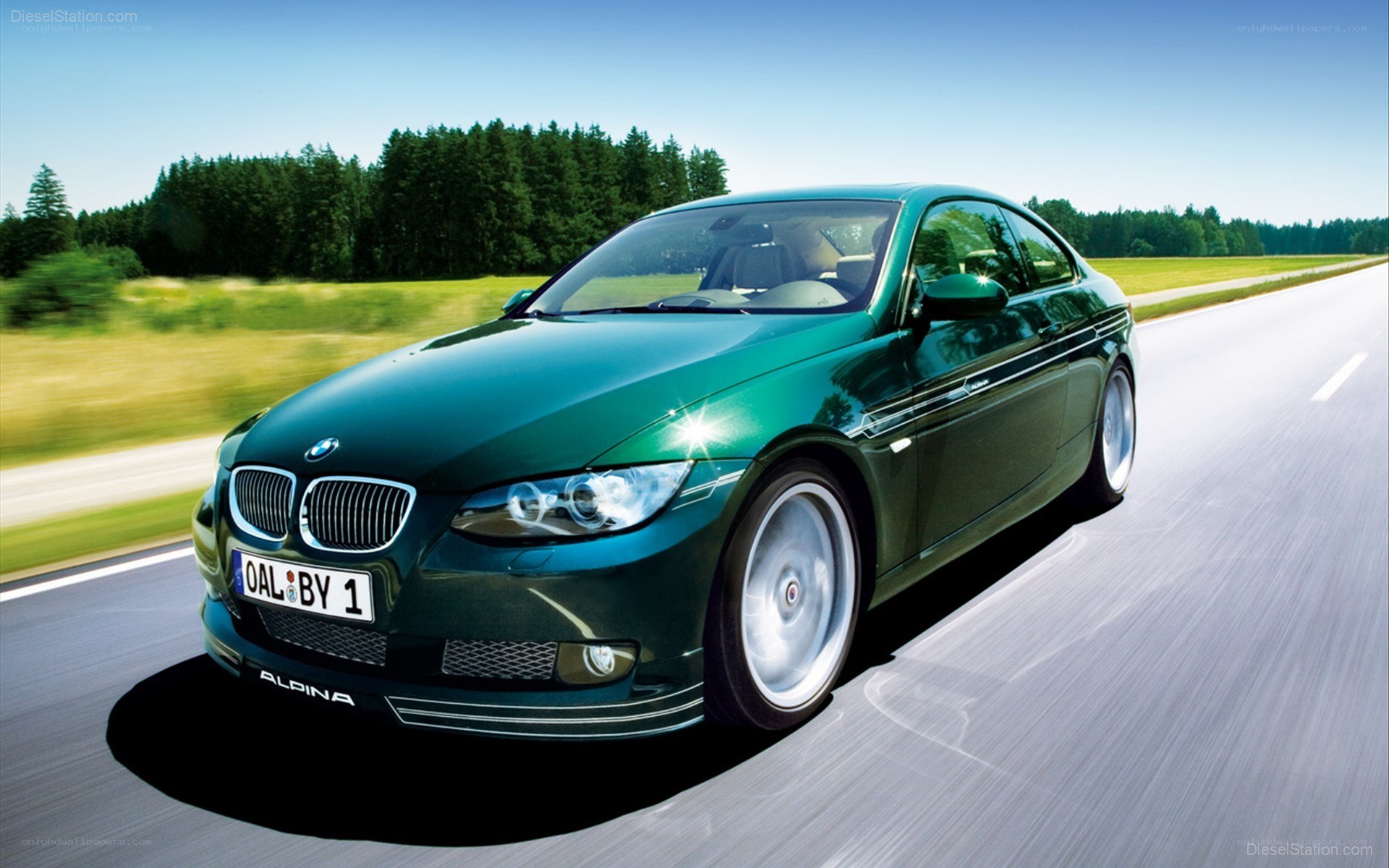 green bmw alpina on road