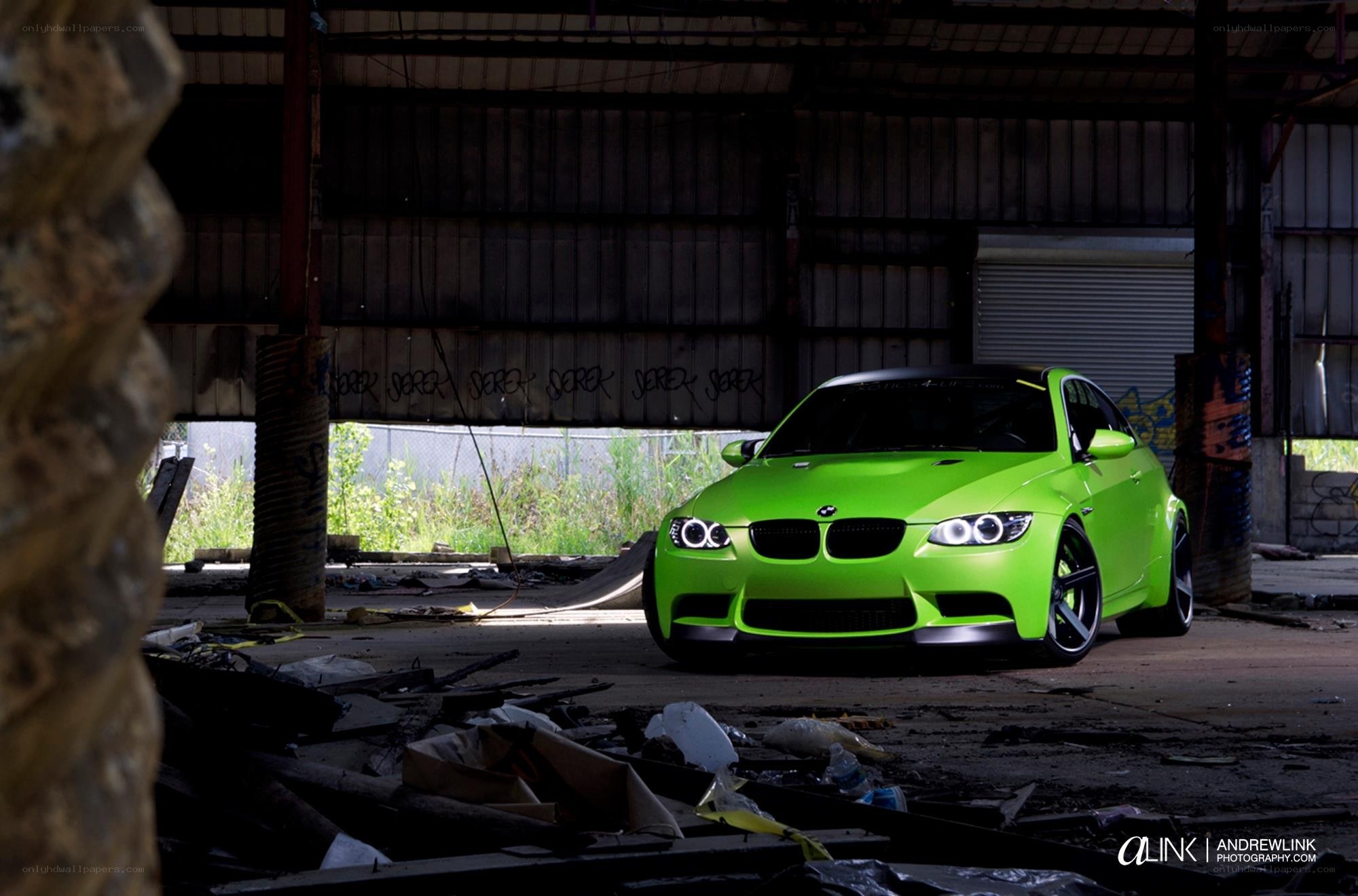 green bmw in abandoned warehouse