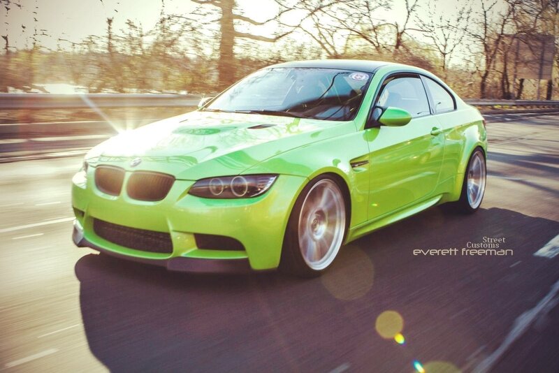 green bmw m3 in motion