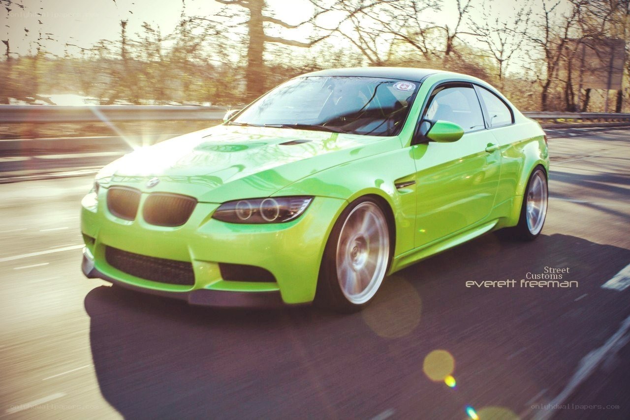 green bmw m3 in motion