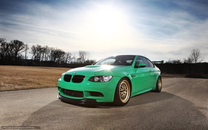 green bmw m3 on road