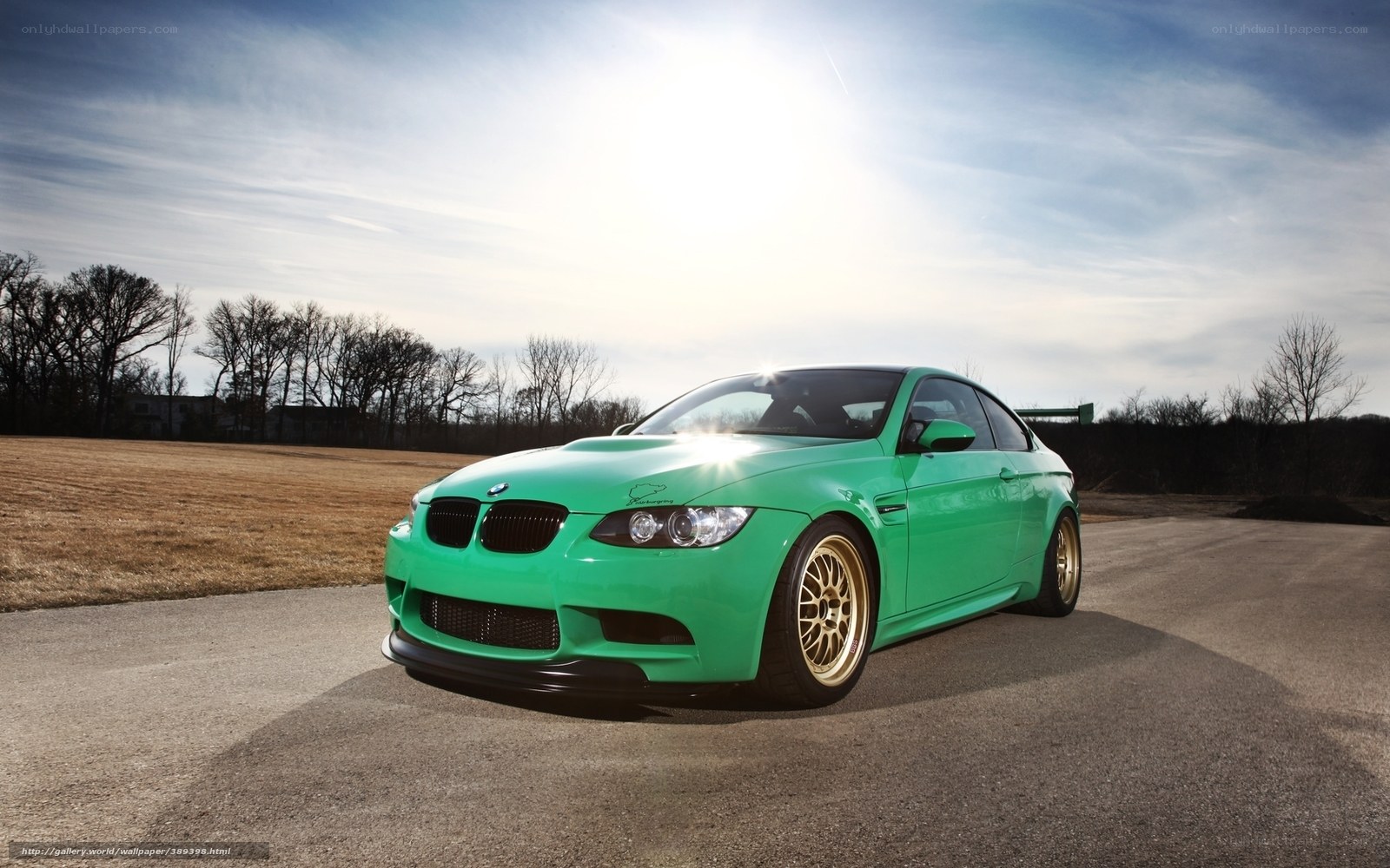 green bmw m3 on road