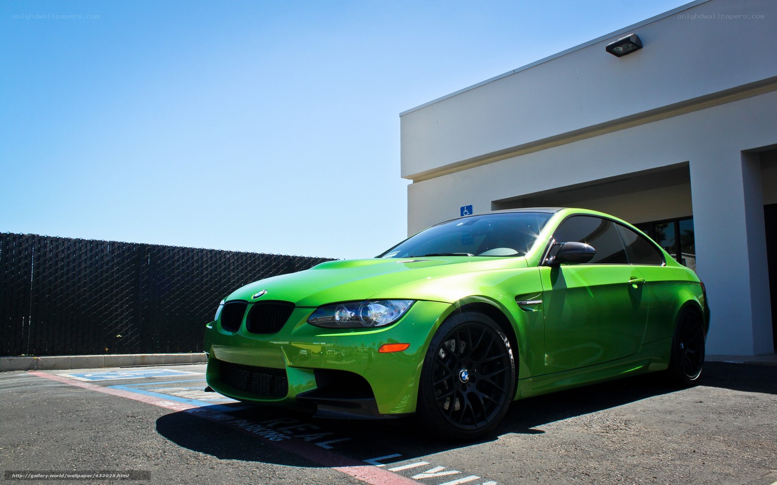 green bmw m3 parked outside