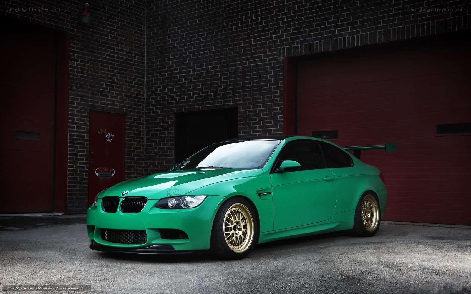 green bmw m3 with gold wheels