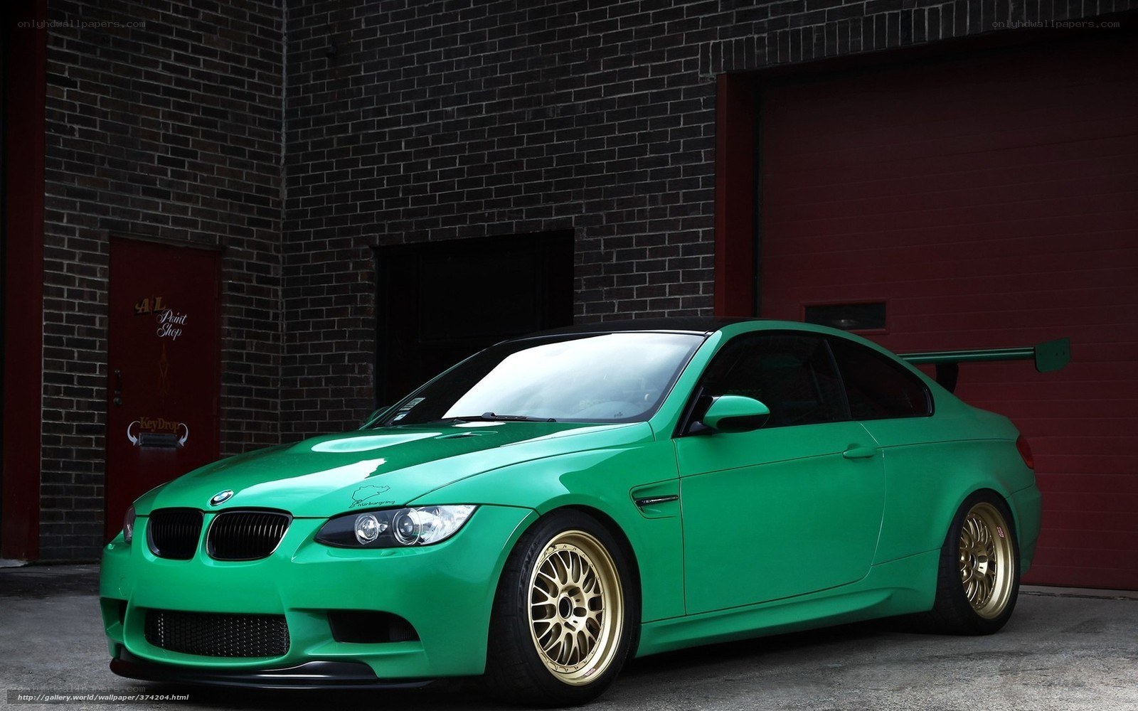 green bmw m3 with gold wheels