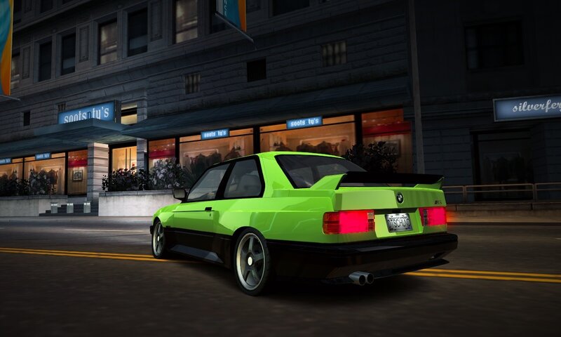 green bmw on city street