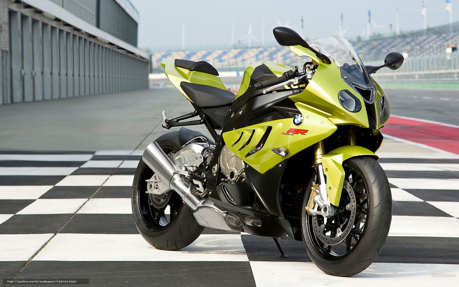 Green BMW S1000RR on racetrack