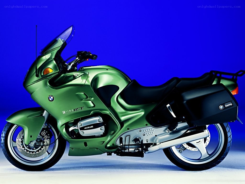 green BMW touring motorcycle