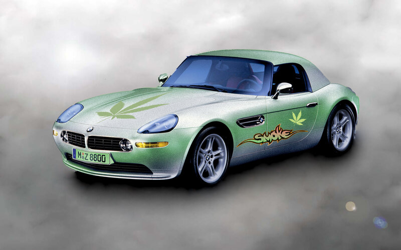 Green BMW Z8 with cannabis decals