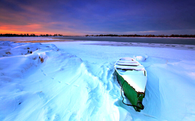 Green Boat in Snow