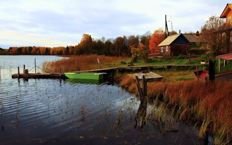 Green Boat on Lake — Blue