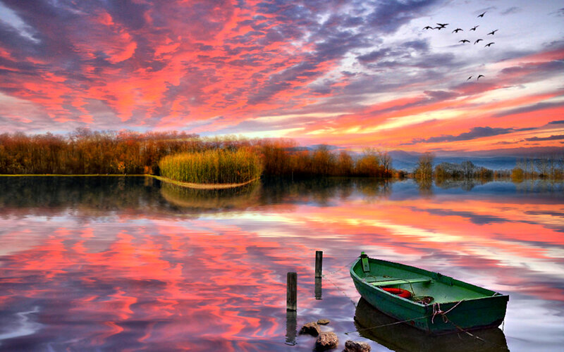 Green Boat on Lake — Red