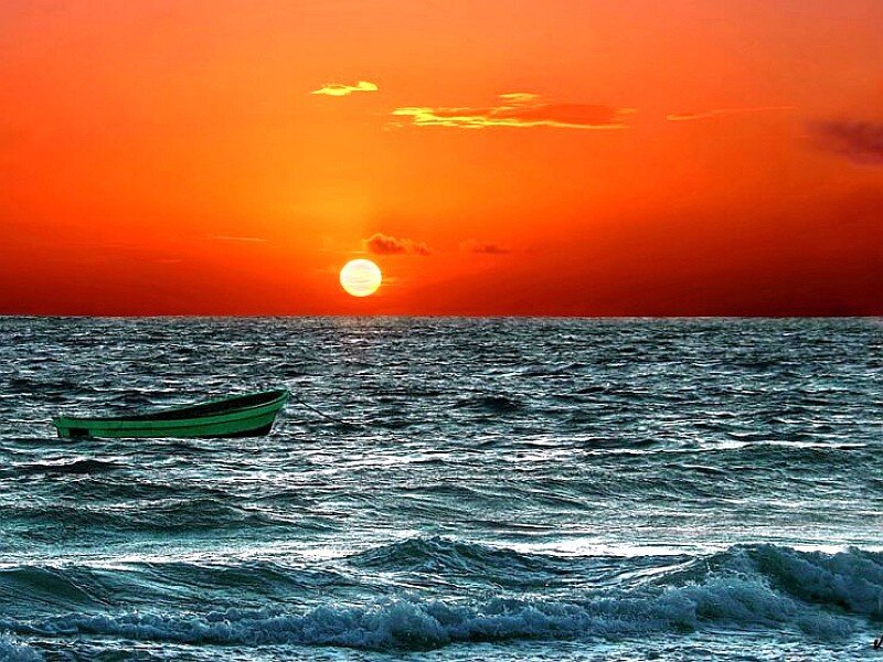 Green Boat on Ocean