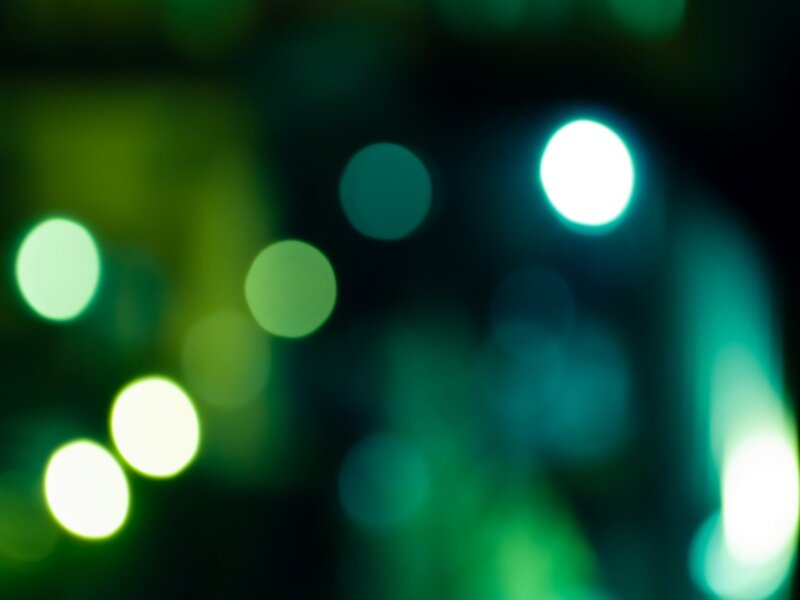 green bokeh lights at night