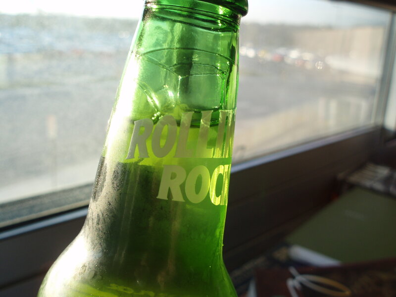 green bottle by window