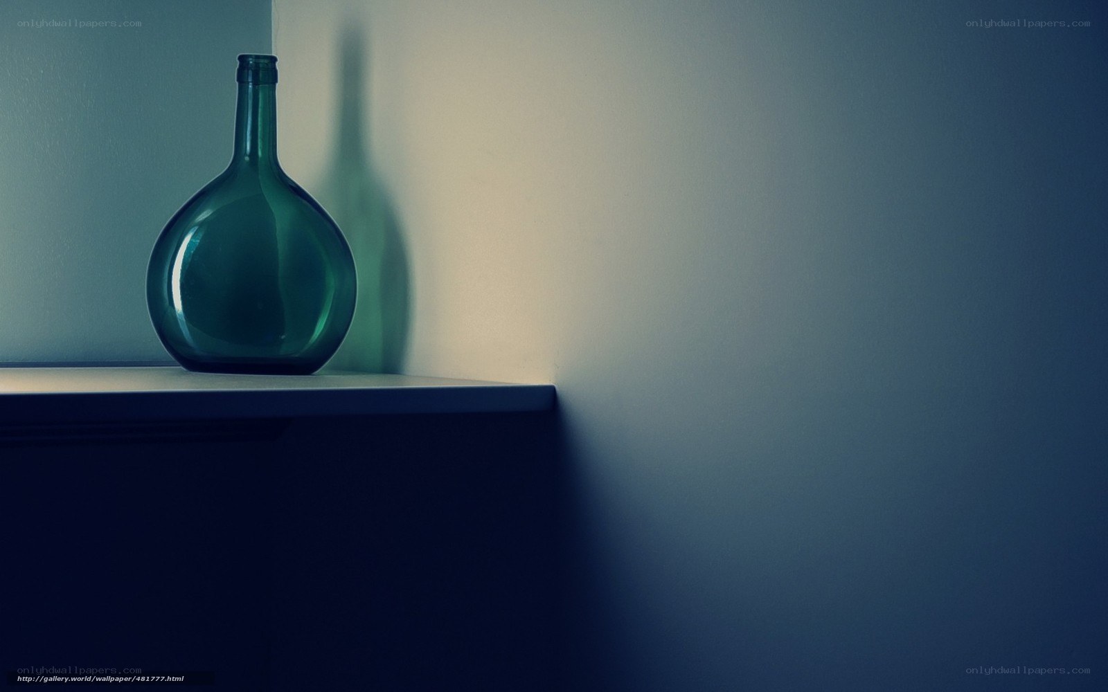 green bottle on a shelf